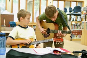 Guitar Guitar teacher and student