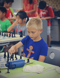 A chess student moves his king out of check.