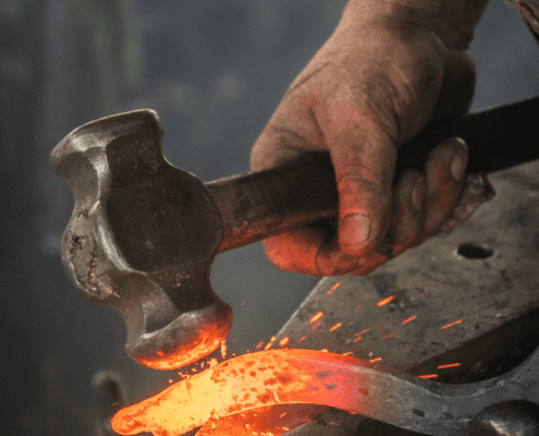 Extreme heat and constant pound by a heavy hammer are required for forging steel.