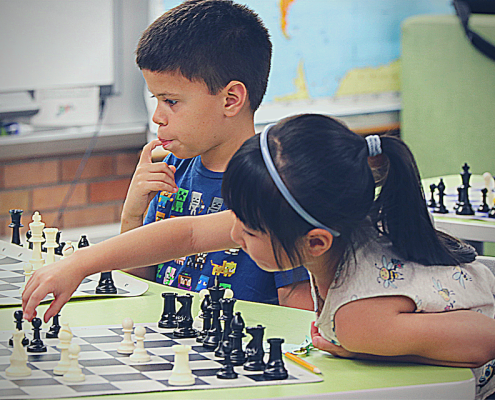Chess player about to make a great move.